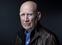 Brazilian photojournalist Sebastiao Salgado poses during a photo session in Paris on May 18, 2021. (Photo by JOEL SAGET / AFP)