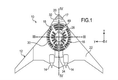Parte superior del avión. Se pueden observar la cabina de forma circular y los motores en la parte inferior de la aeronave.