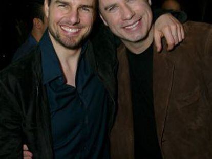 Tom Cruise y John Travolta, durante un cumpleaños de este último.