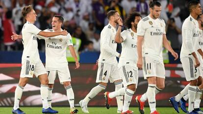 Llorente y Lucas Vázquez se abrazan tras un partido.