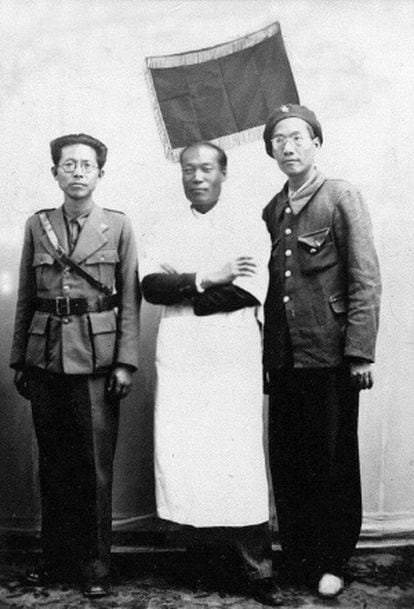Xie Weijin (izda.) Lui Huanfeng (centro) y Zhang Ji.