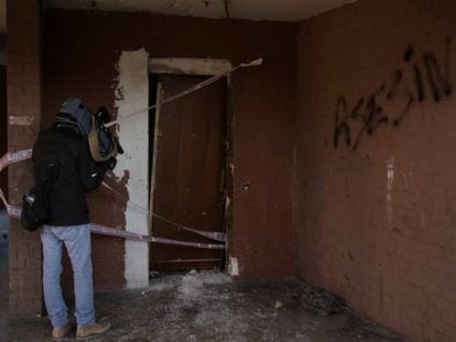 Entrada del piso del presunto asesino de un vecino de Baró de Viver.