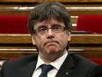 Catalonia's regional President Carles Puigdemont attends a parliamentary session in Barcelona
