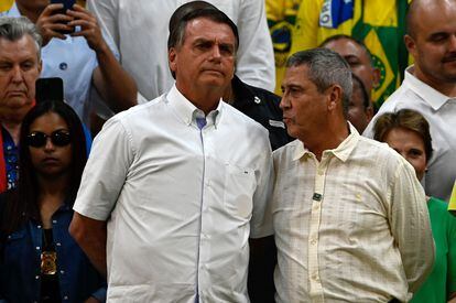 Brazilian President Jair Bolsonaro with vice presidential candidate Walter Braga Netto at a rally in Rio de Janeiro July 24. 