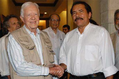 Daniel Ortega, junto a Jimmy Carter, tras su reunión.