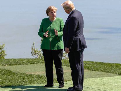 La canciller alemana, Angela Merkel, y el presidente de EE UU, Donald Trump, en la reuni&oacute;n del G7, el pasado d&iacute;a 7 en Charlevoix (Qu&eacute;bec, Canad&aacute;).