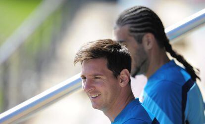 Messi, junto a Pinto, en el entrenamiento de hoy.