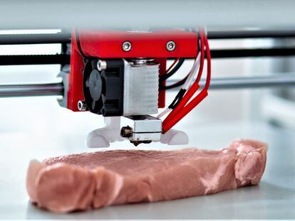 Absolutely alike. The close up of a 3D printer recreating a piece of meat, imitating all the little details
