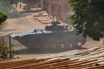 A Sudanese armored car remains parked in a neighborhood south of the country's capital, Khartoum, last Sunday.