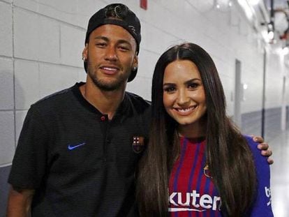 El jugador del FC Barcelona Neymar y la cantante Demi Lovato.