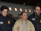 Mexico's top drug lord Joaquin "El Chapo" Guzman is escorted as he arrives at Long Island MacArthur airport in New York