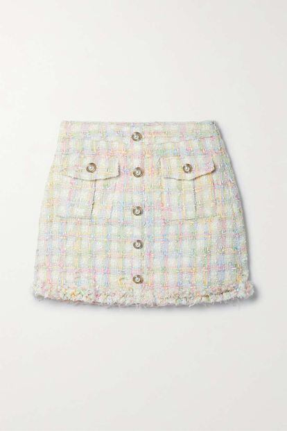 Si lo tuyo es el estilo romántico, te gustará esta minifalda de tweed en tonos pastel de LoveShackFancy.

338,21€
