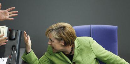 La canciller alemana, Angela Merkel, ayer durante el debate en el Bundestag.