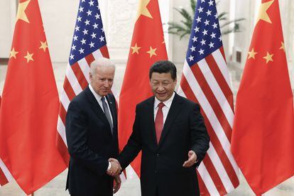 Xi Jinping y Joe Biden en una imagen de 2013 en Beijing.