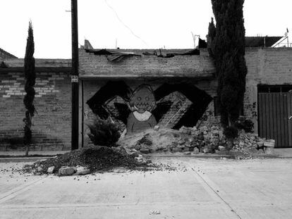 Un grafiti -previo al caso- en uno de los barrios de los ataques.
