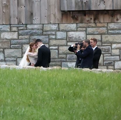 Jennifer Gates poses with Nayel Nassar during their wedding.