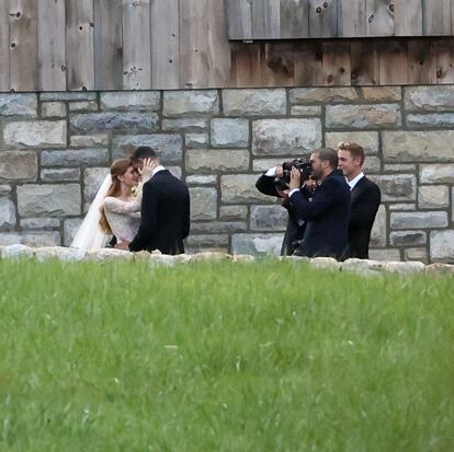 Jennifer Gates poses with Nayel Nassar during their wedding.