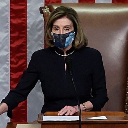 U.S. House Speaker Nancy Pelosi (D-CA) presides over the vote to impeach President Donald Trump for a second time, a week after his supporters stormed the Capitol building, on the floor of the House of Representatives in Washington January 13, 2021. REUTERS/Jonathan Ernst     TPX IMAGES OF THE DAY
