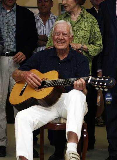 Jimmy Carter y detrás su esposa, en Esquivias, Toledo.