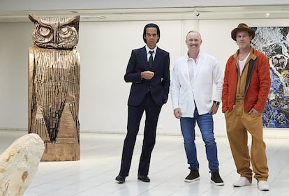 From left, Australian singer Nick Cave, British sculptor Thomas Houseago and American actor Brad Pitt present a joint exhibition at The Sara Hilden Art Museum in Tampere, Finland, on September 19, 2022.