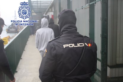 A National Police officer is guarding an alleged skipper.