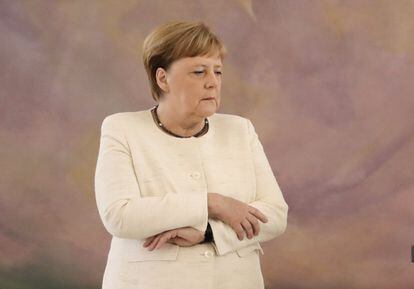 Merkel sufre un episodio de temblores durante un acto público en el palacio Bellevue en Berlín, en junio de 2019.