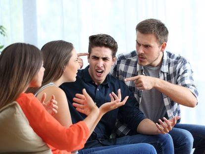 Four angry friends arguing at home