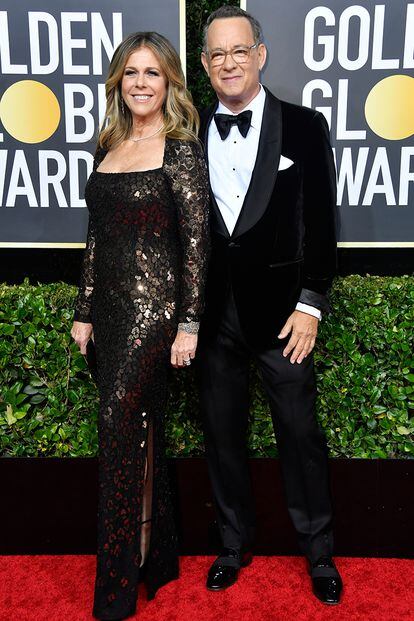 Tom Hanks y su esposa, la productora Rita Wilson. Él estaba nominado a mejor actor de reparto por la película Un amigo extraordinario, que no ganó, aunque recibió un sentido homenaje a su carrera.