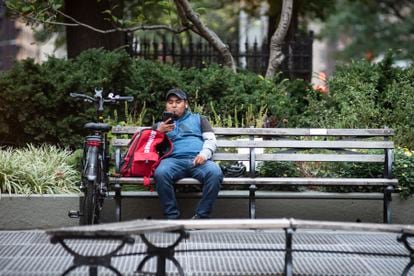 A delivery man consults the application that distributes the orders, last week in New York.