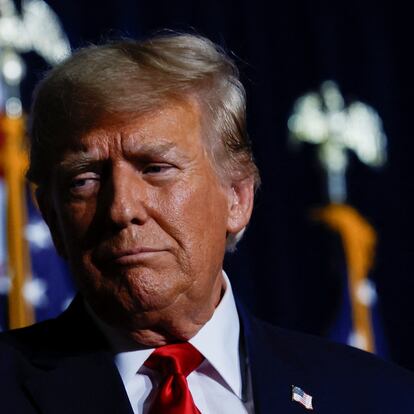 Republican presidential candidate and former U.S. President Donald Trump gestures during his Iowa caucus night watch party in Des Moines, Iowa, U.S., January 15, 2024.  REUTERS/Evelyn Hockstein