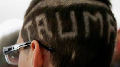 Fourteen year-old David Fargnoli has "TRUMP" shaved into his hair before a campaign rally with U.S. Republican presidential candidate Donald Trump in Warwick