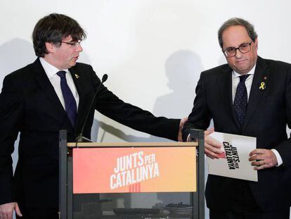 El expresidente Carles Puigdemont, junto al jefe del Govern, Quim Torra.