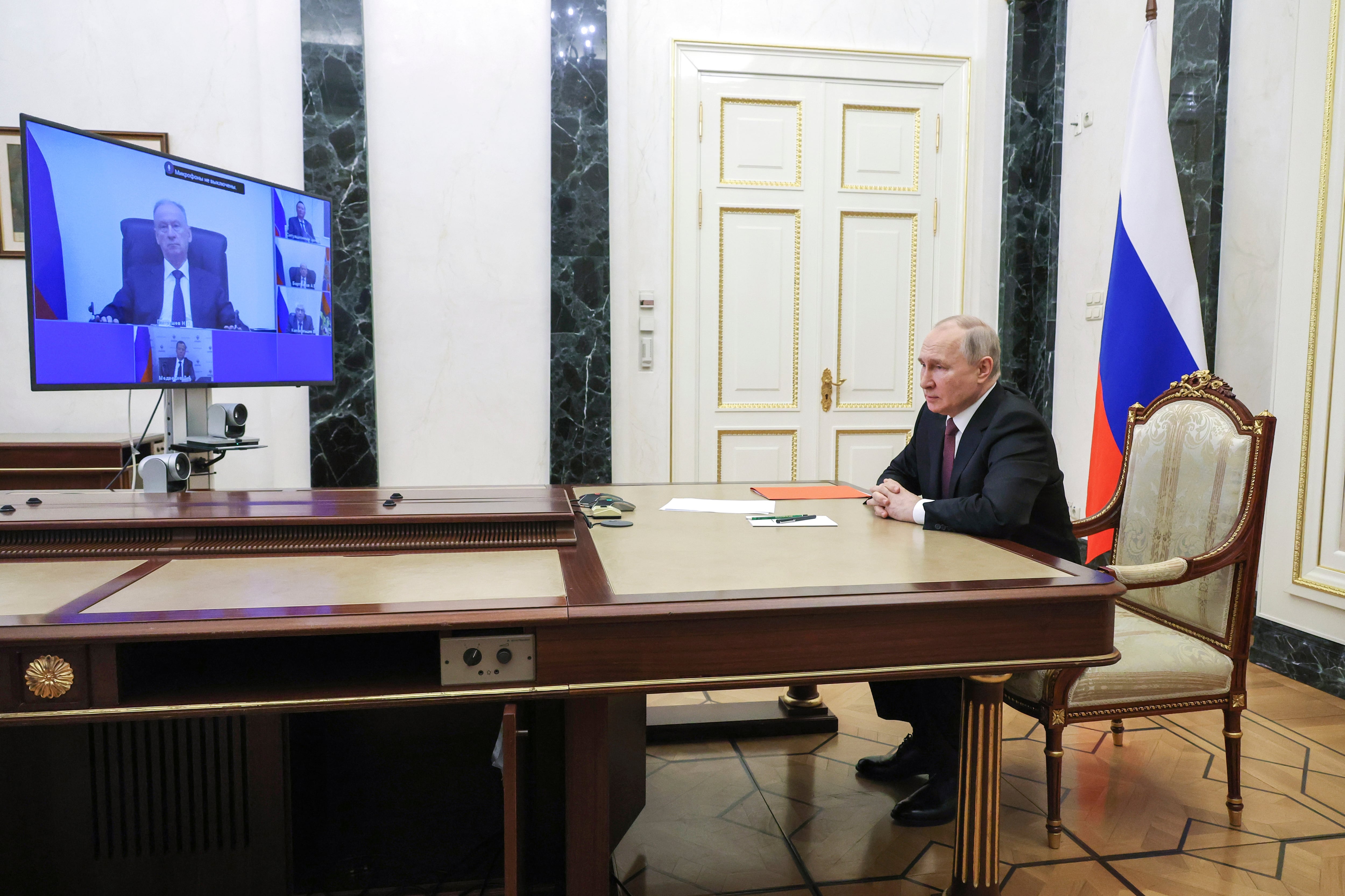 Russian President Vladimir Putin chairs a meeting with members of the Security Council via a video conference in Moscow, Russia, Friday, May 5, 2023. (Mikhail Klimentyev, Sputnik, Kremlin Pool Photo via AP)