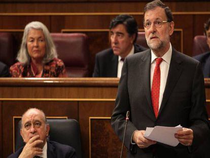 Mariano Rajoy y Jorge Fernández Díaz en una sesión plenaria del Congreso.