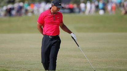 Tiger se duele en el pasado Cadillac Championship.