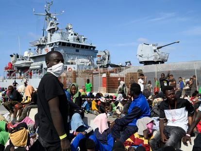 Migrants wait to be transferred from Lampedusa Island, Italy, Friday, Sept. 15, 2023