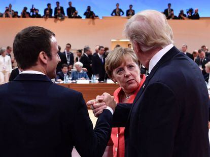 Donald Trump, Emmanuel Macron y Angela Merkel en la reciente reuni&oacute;n del G20 en Hamburgo.