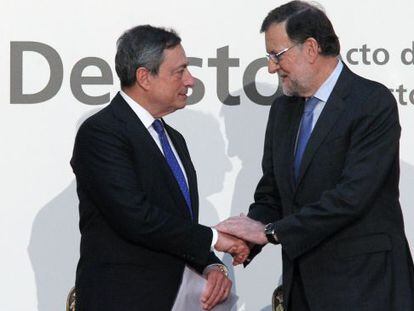 Mario Draghi, presidente del BCE, y Mariano Rajoy, presidente del Gobierno