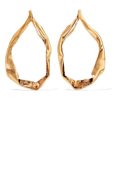 Aros retorcidos de Tom Ford, perfectos para un evento de noche (c.p.v.)