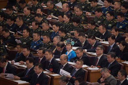 Delegados durante la ceremonia de apertura del Congreso Nacional del Partido Comunista Chino celebrado en Pekín, el 18 de octubre de 2017.
