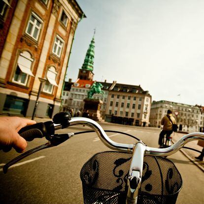 Riding through Copenhagen on bike.