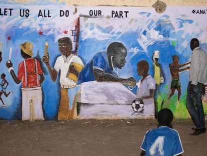 Mural de los miembros de #Anataban en el que se lee: "Pongamos cada uno de nuestra parte", en Juba.