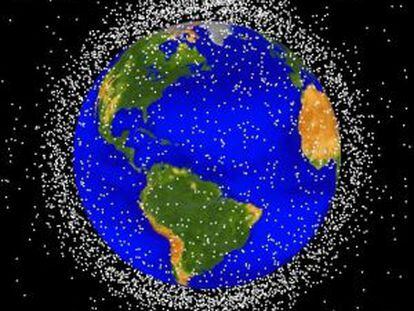 Simulaci&oacute;n generada por ordenador de la nube de basura espacial alrededor de la Tierra en &oacute;rbita baja.
 