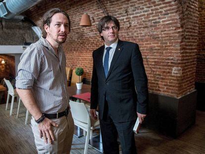 Pablo Iglesias y Carles Puigdemont, este lunes en Madrid.