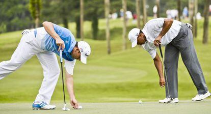 Sergio García y Tiger Woods en The Players.