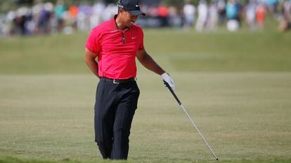 Tiger se duele en el pasado Cadillac Championship.