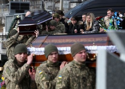 Funeral and burial of four of the soldiers killed in the attack on the Yavoriv base in Lviv, Ukraine.  James Villanueva.