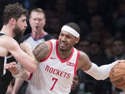 Carmelo Anthony y Joe Harris en un Houston-Brooklyn.