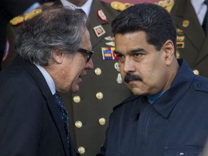 El presidente Maduro (derecha) en un acto en Caracas este lunes.