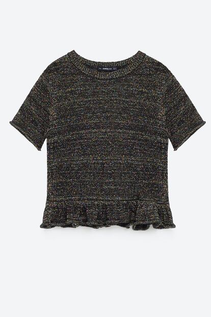 Top de Zara con volante. (19,95 euros)